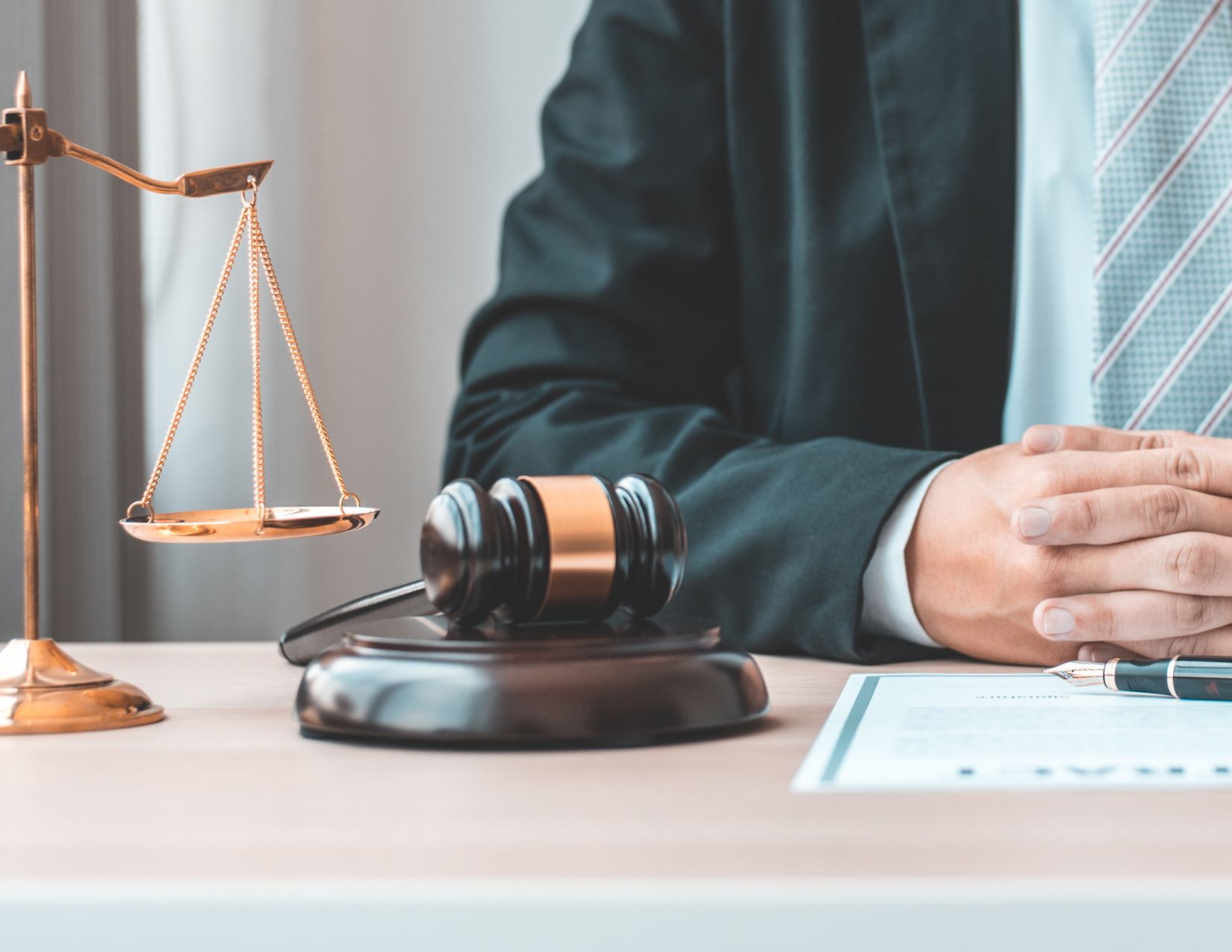 balance gavel and man in suit